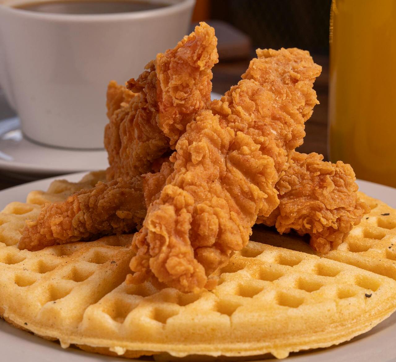 Crispy Fried Chicken on Waffles with Coffee and Juice
