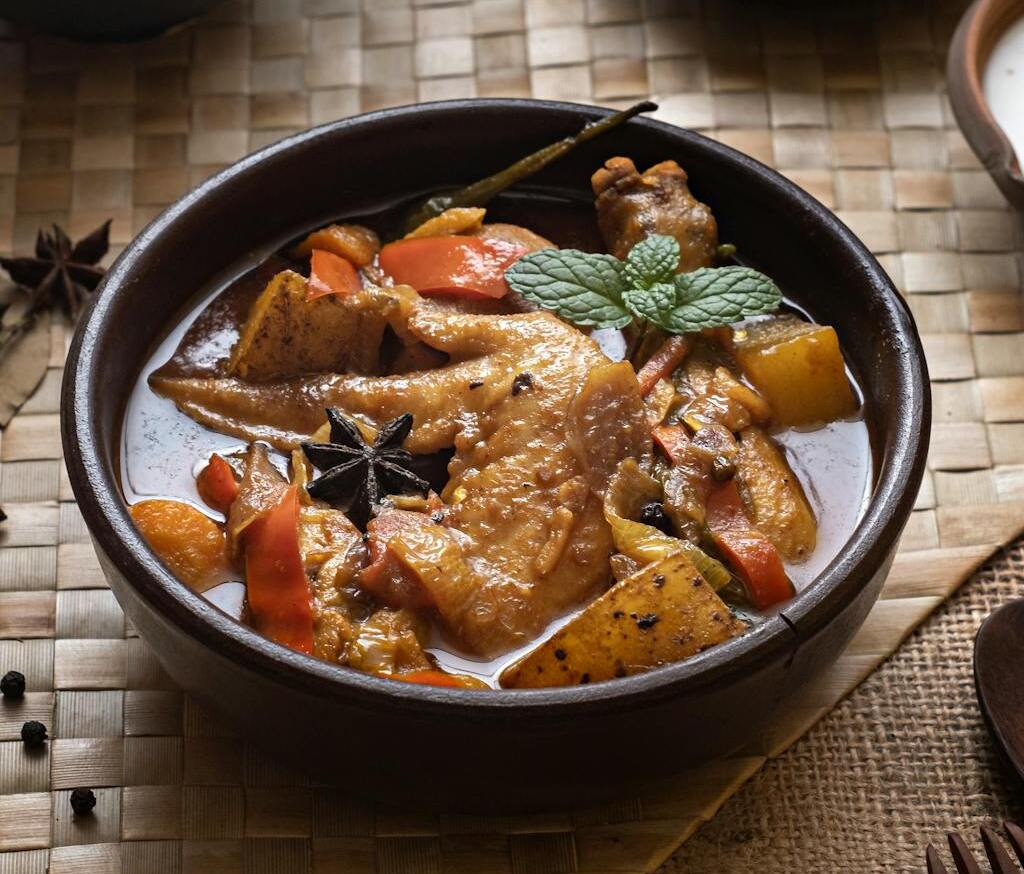 Curry Chicken in Bowl on Table
