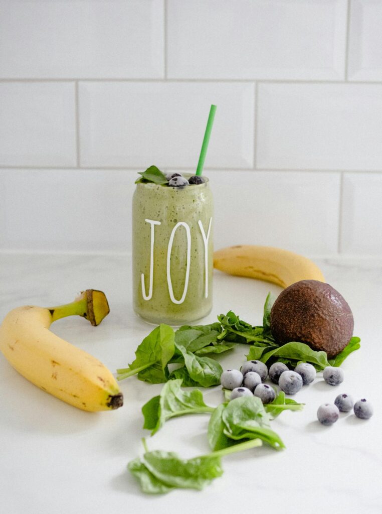 Spinach and kale are popular choices for adding to fruit smoothies 