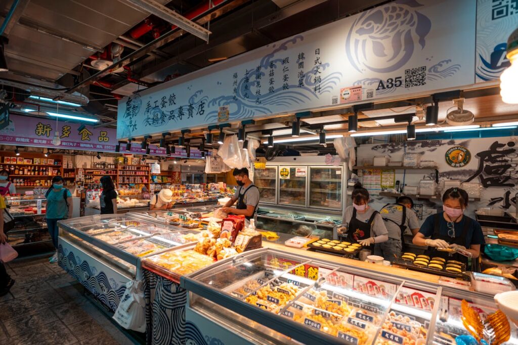 People Selling Cooked Food in the Market