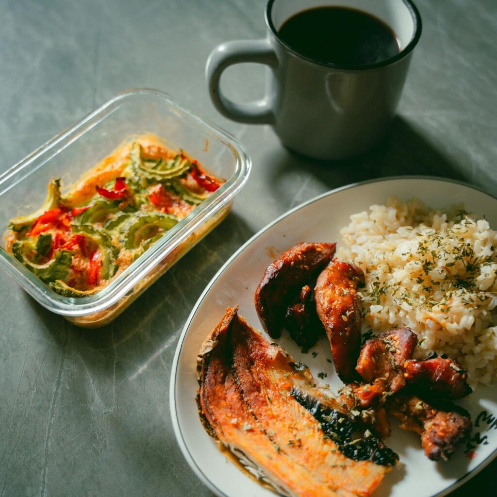 small bowls or plates, each containing a different leftover dish, ready for assembling new meals.