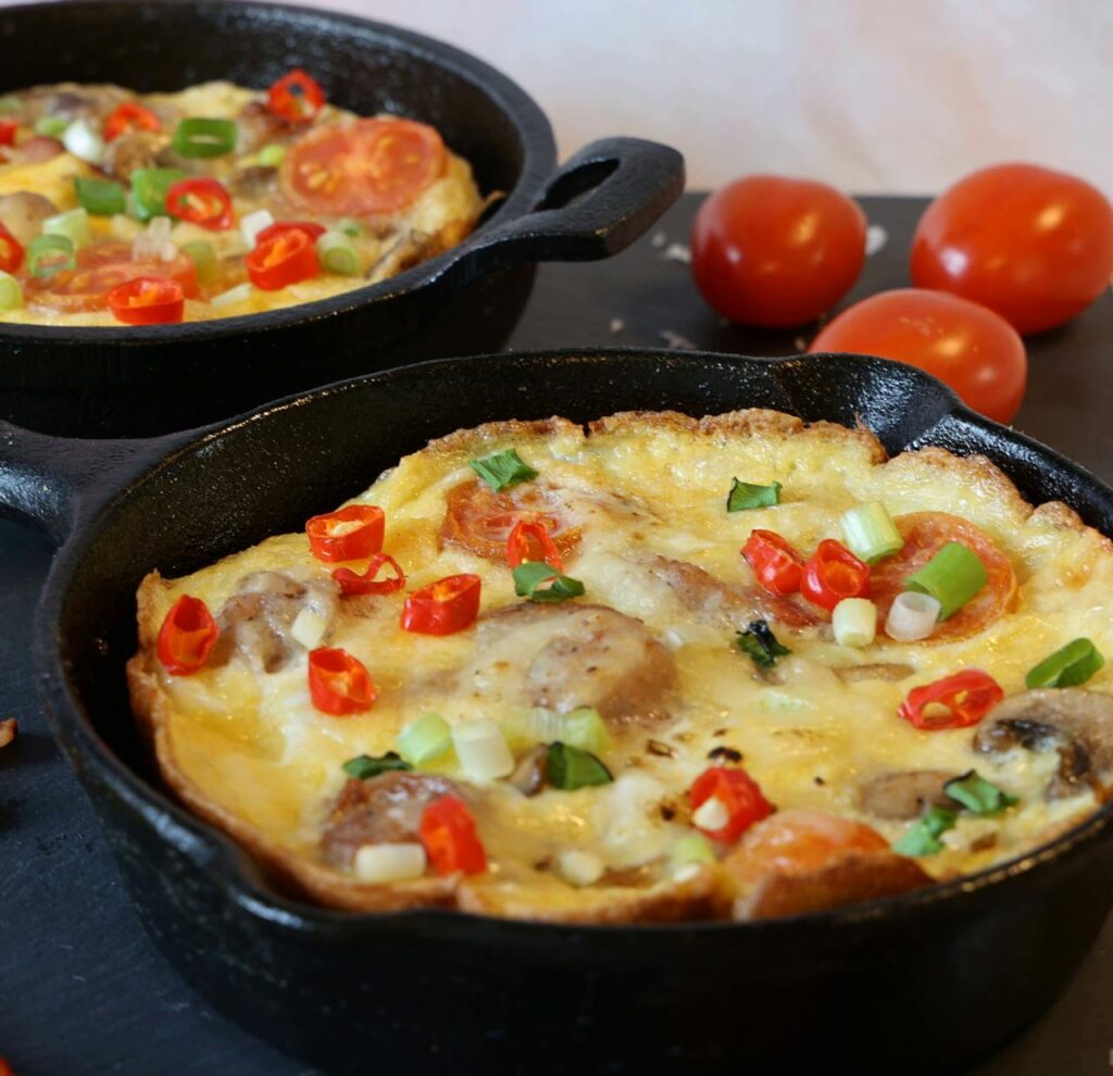 Omelet or frittata filled with chopped roasted vegetables.