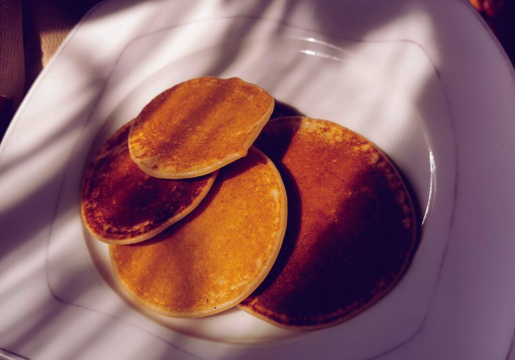 Delicious Pancakes on a White Plate