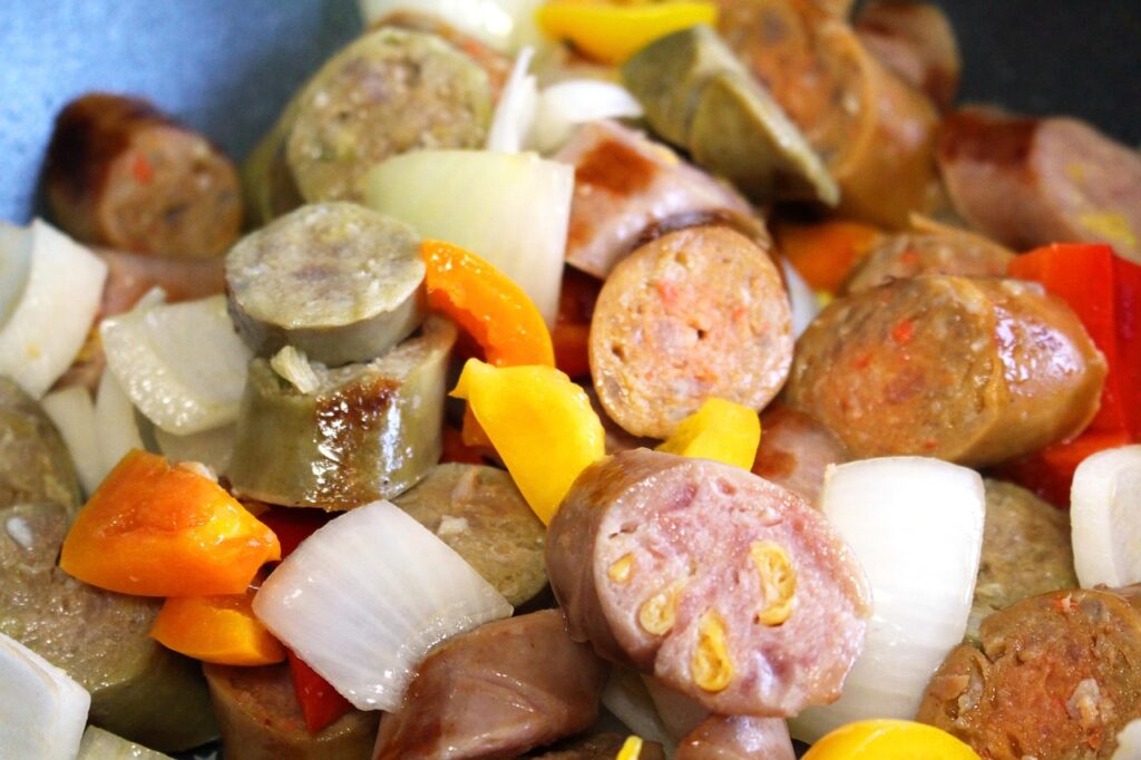 Sausage and roasted peppers/onions, ready to be served on rolls.
