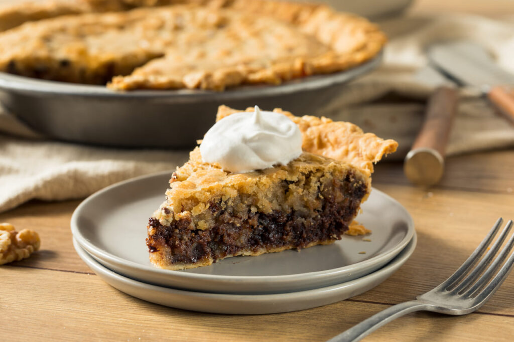 Homemade Chocolate Walnut Derby Pie with Whipped Cream