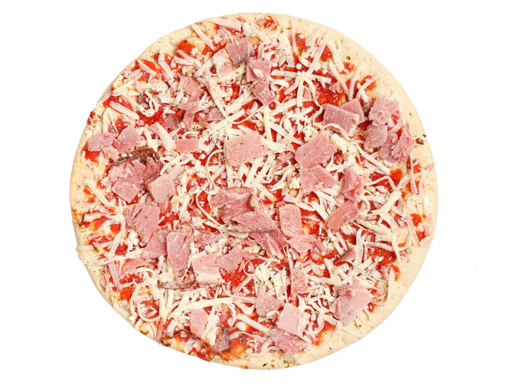Whole frozen raw round pizza with smoked meat, mozzarella cheese and tomato sauce, 
isolated on white background, close-up, top view