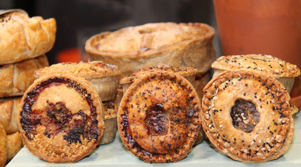 A Display of Freshly Made Sweet and Savoury Pies.