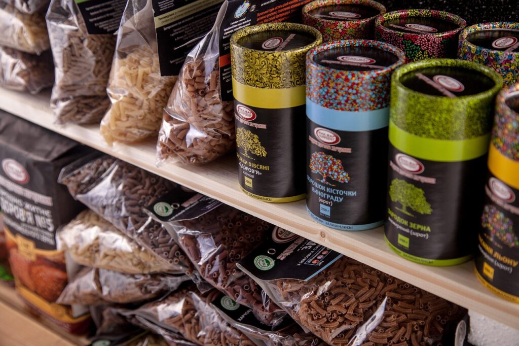 Store shelf, Shelf with goods, Tubes image.