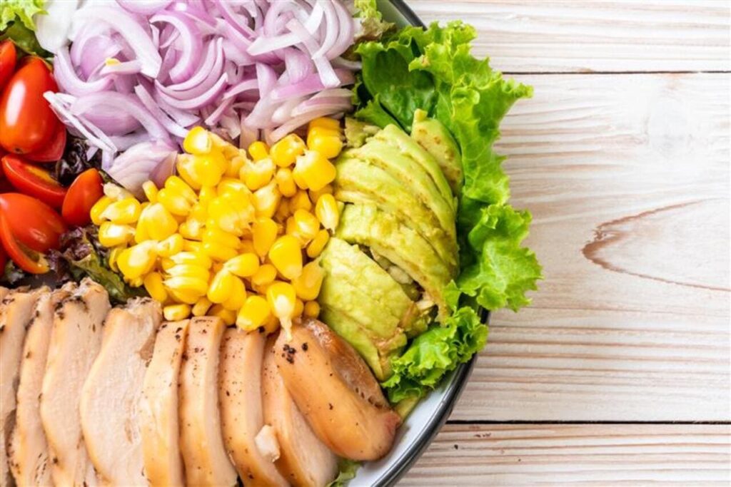 Healthy salad bowl with chicken breast - healthy food style