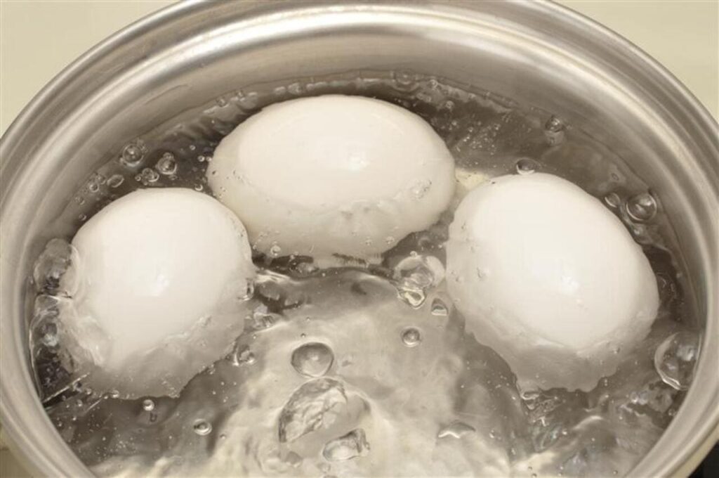 eggs boiling in water