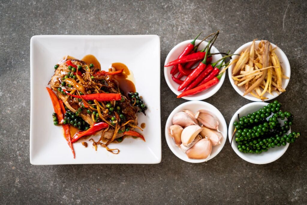 stir-fried spicy and herb with grouper fish fillet - Thai food style