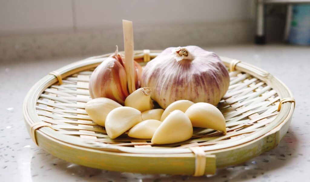Basket of garlic bulbs on a counter