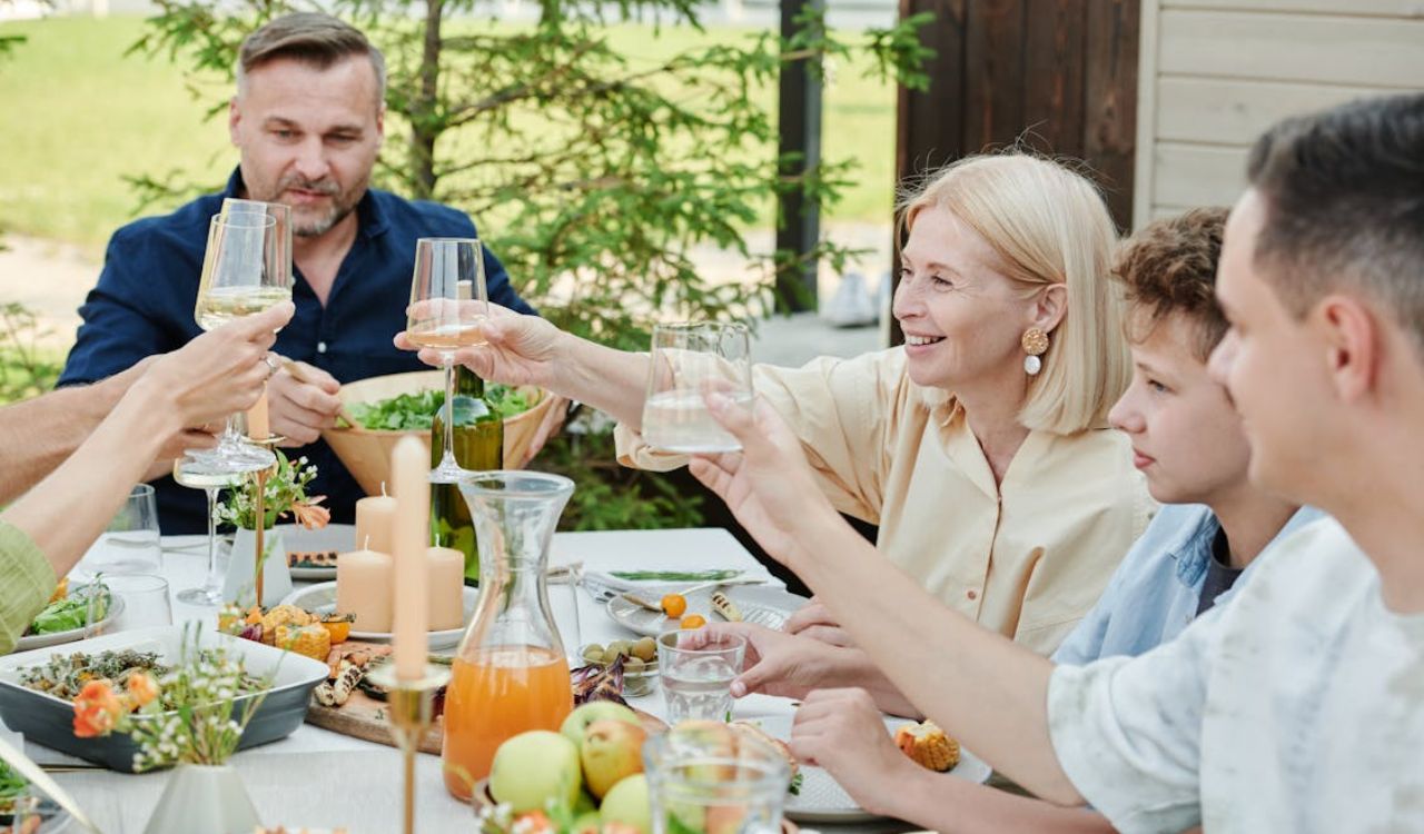 Family eating outside in the backyard