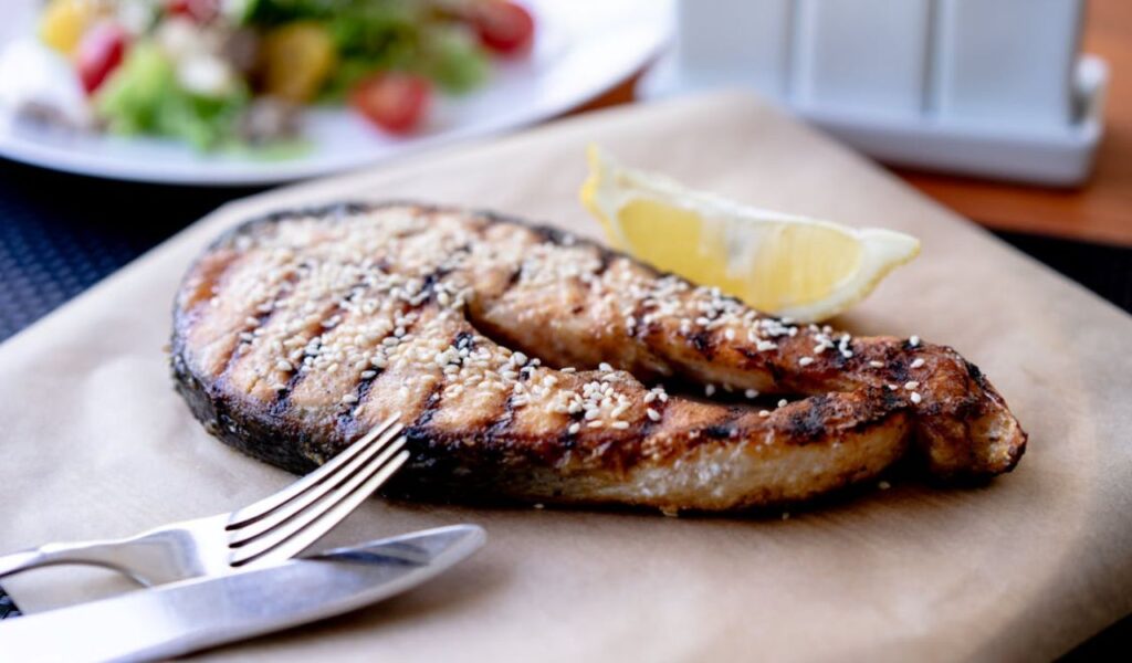 Grilled fish slice on plate
