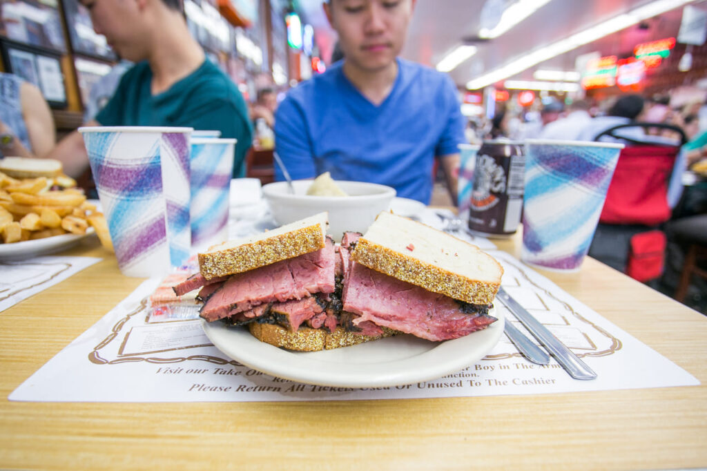 Katz's_Pastrami_-_Smoked_to_juicy_perfection_and_hand_carved_to_your_specifications_