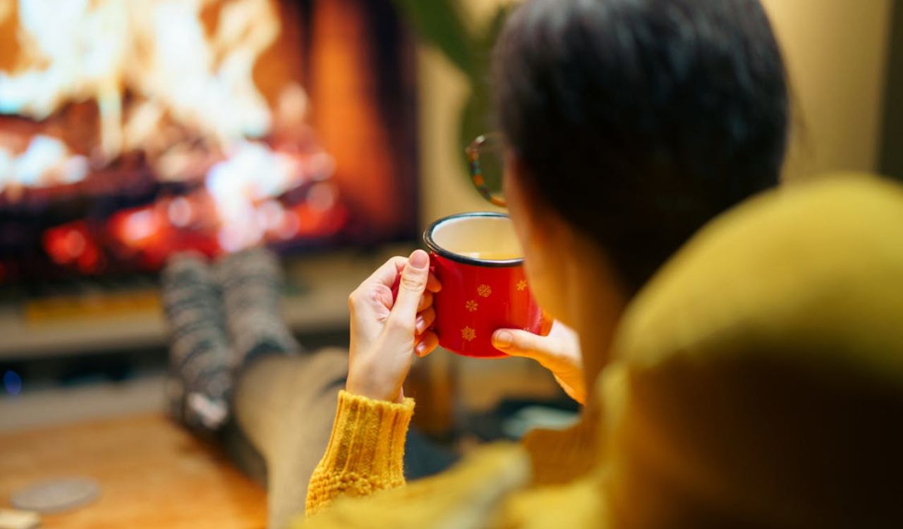 Warm drinks in front of fireplace