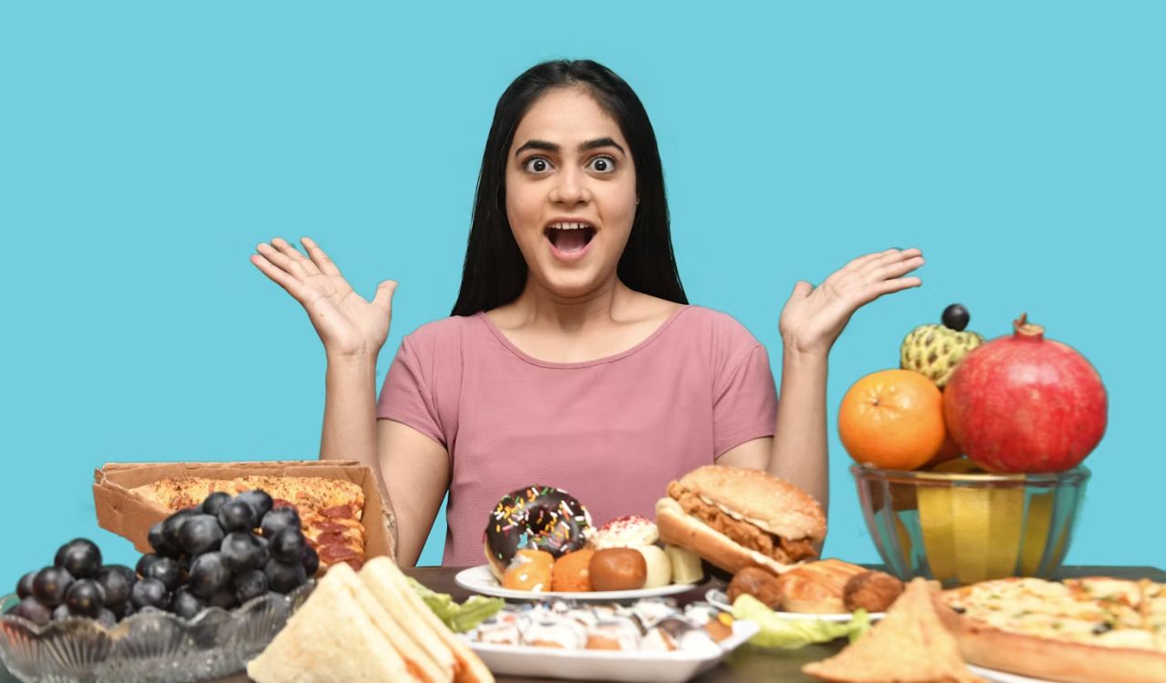 Woman in front of table with food