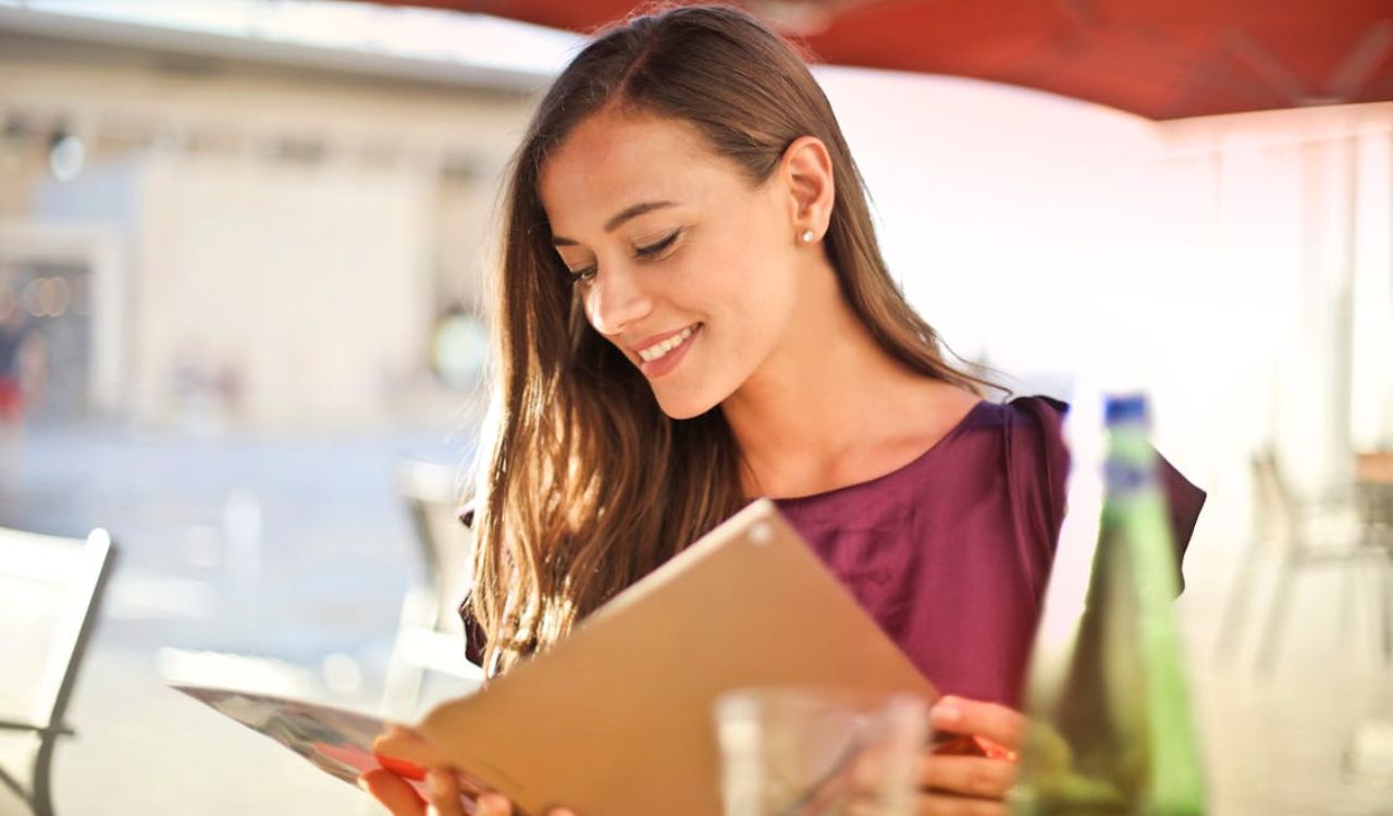 Woman reading menu