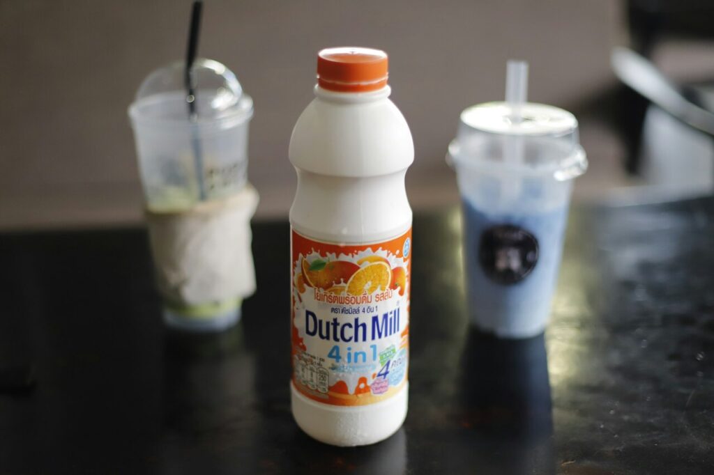 a bottle of malted milk drink on a table