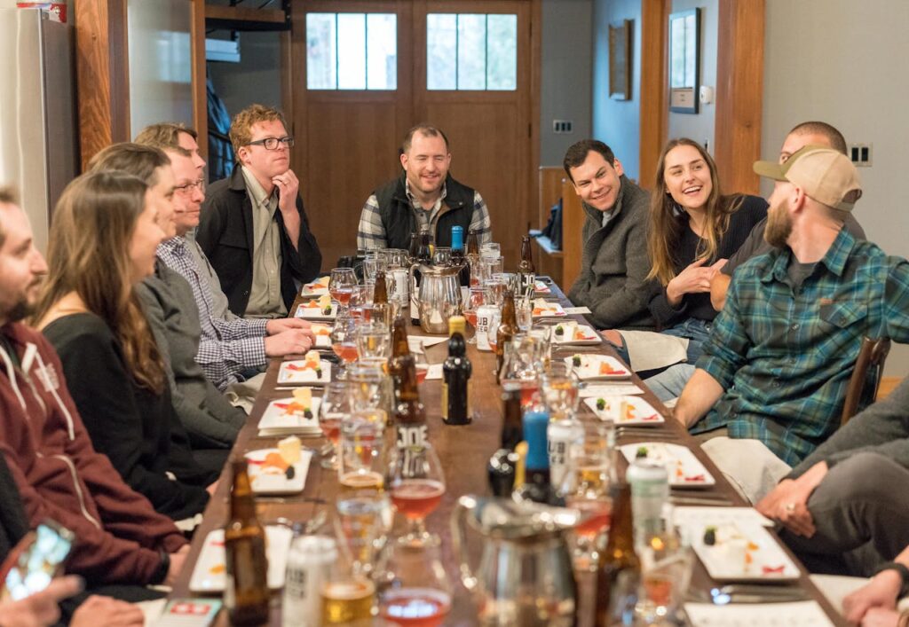 A dinner table with everyone focused on conversation