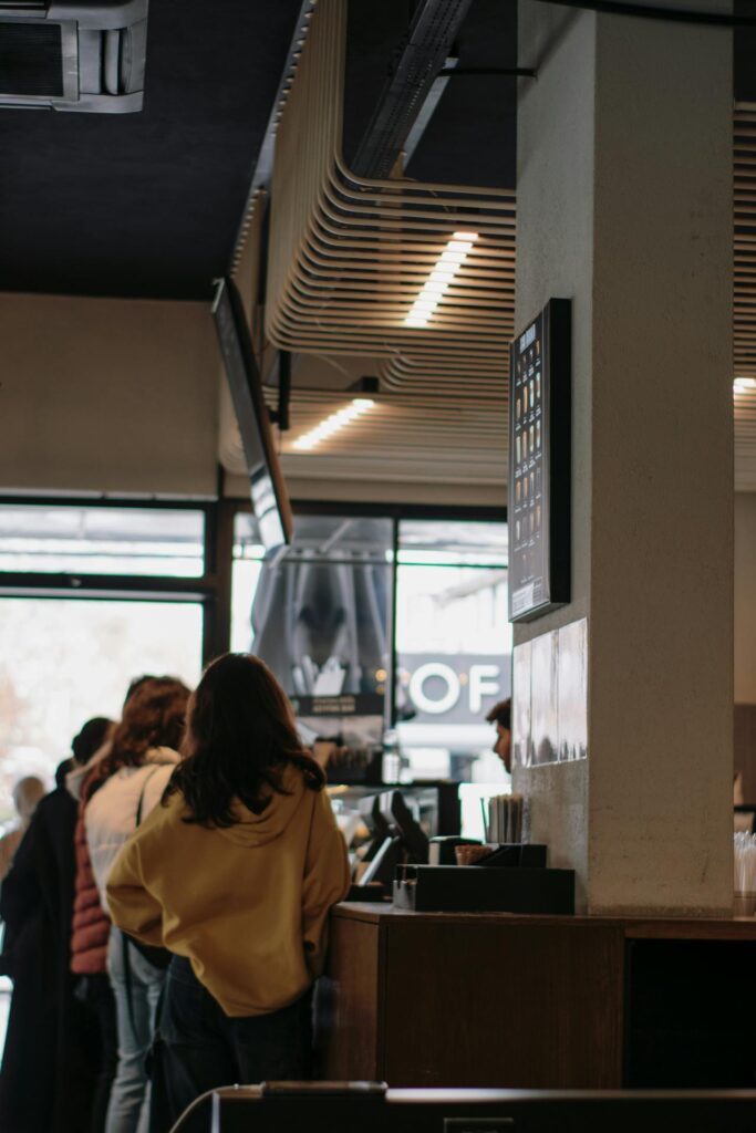 Coffee shop line stretching to the door.