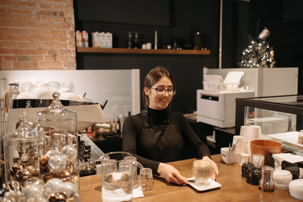 Cups of three different sizes lined up on a counter.