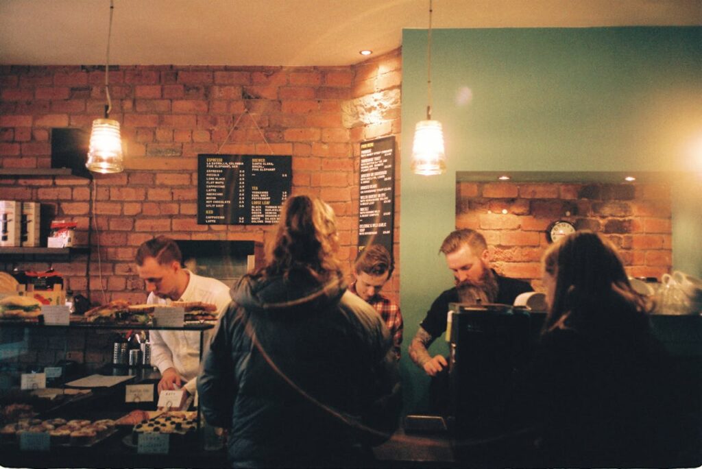 Customers crowding around the drink pickup counter.
