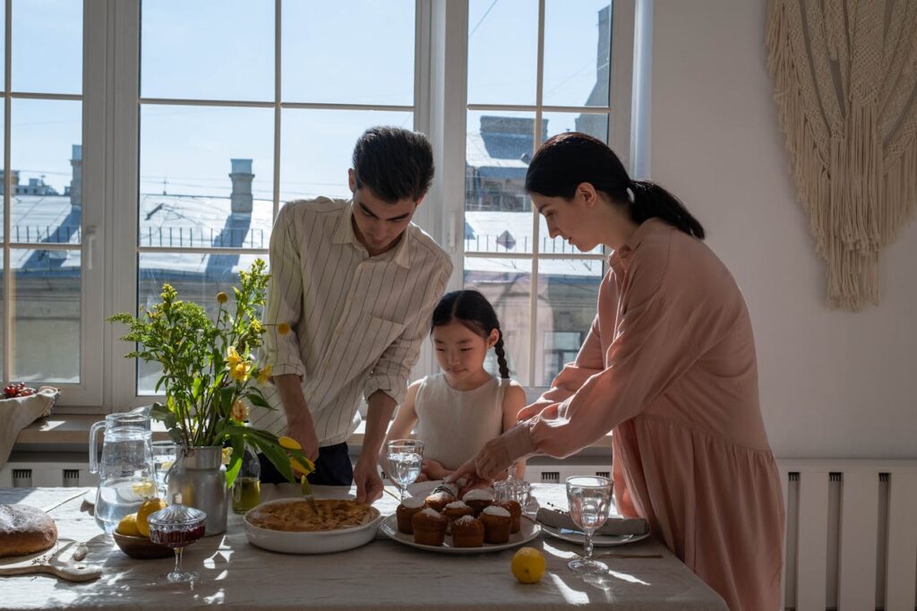 Family Preparing the Dinner Table