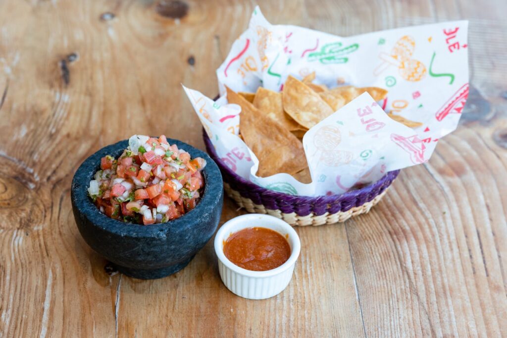 Chips and salsa served before a meal.