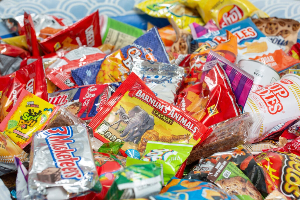 A view of a pile of popular snacks.
