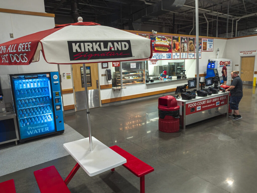 Costco Wholesale Kirkland Signature Food Court Menu Umbrella Tables Picnic In Store Eating Experience
