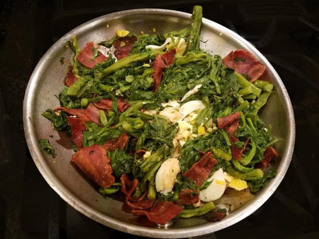 Prepared Polk Salat in metal bowl