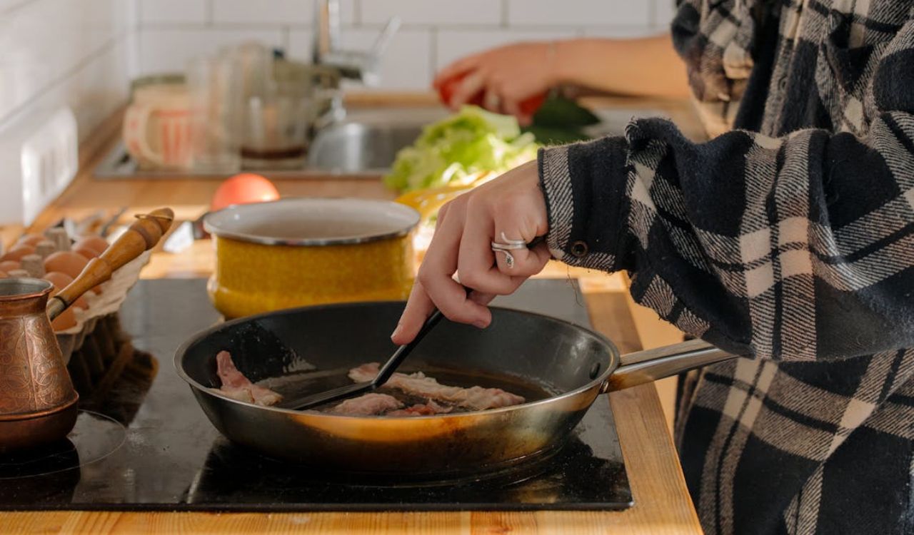 Cooking bacon on stove