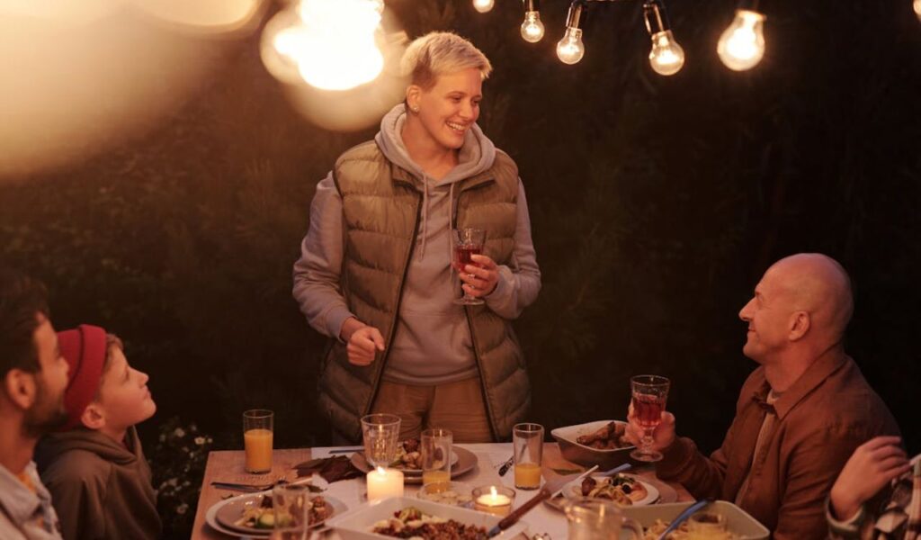 Dinner party host speaking