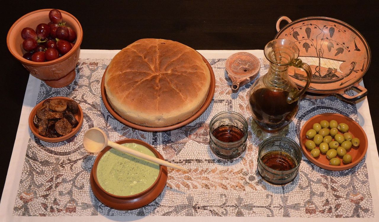 Mixtura cum Caseo (Soft Cheese with a Herb Purée) and Hapalos Artos (soft bread)