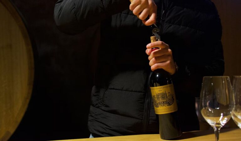Opening wine bottle