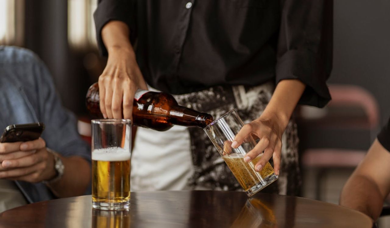 Pouring beer slowly