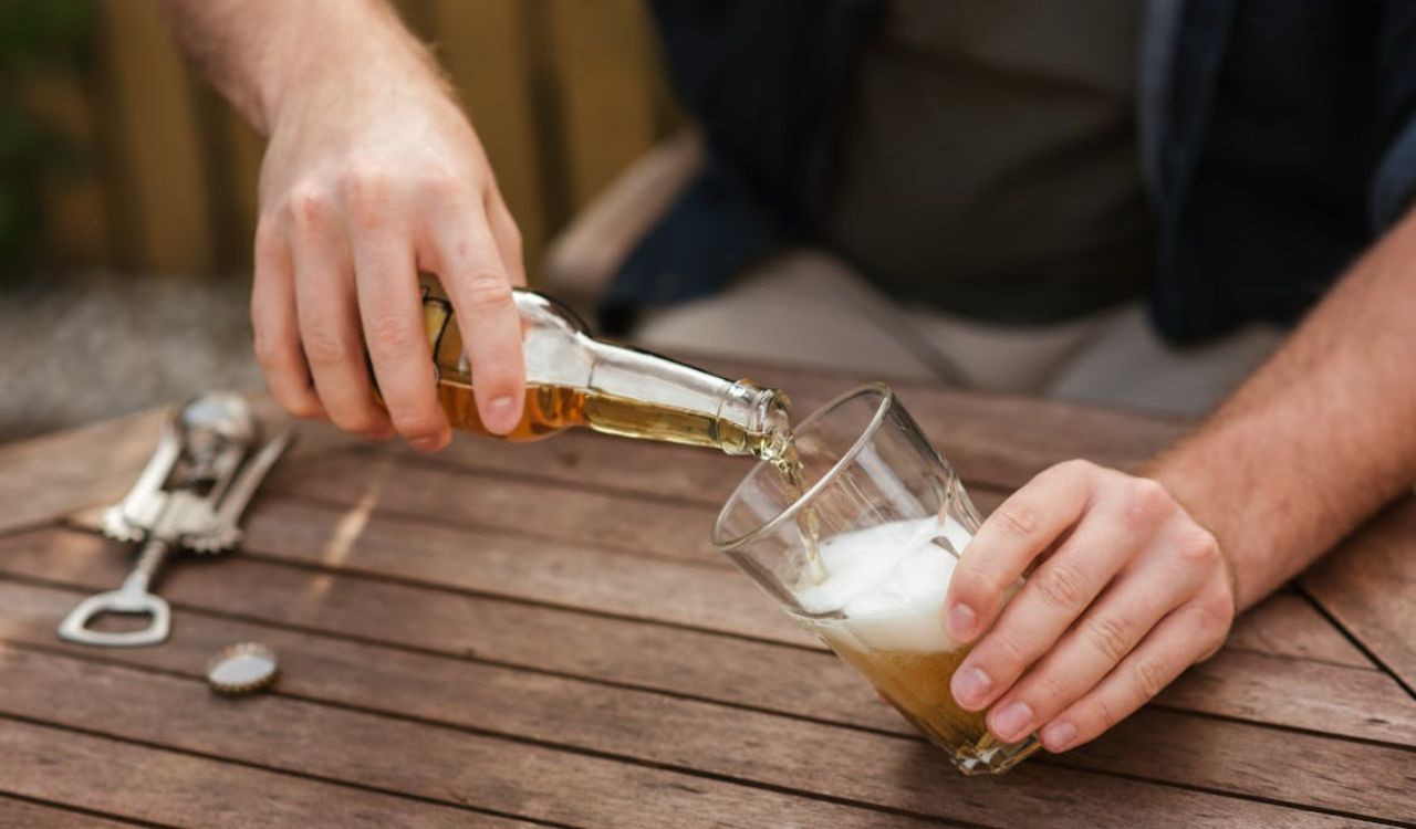 Pouring beer into glass