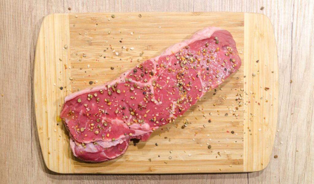 Seasoning a steak
