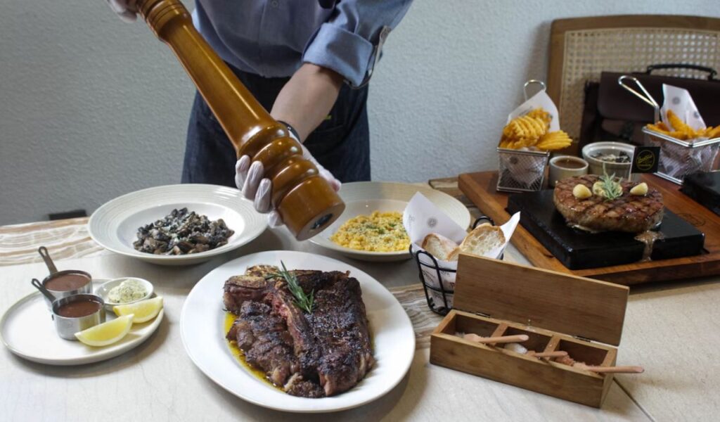 Steakhouse table with food