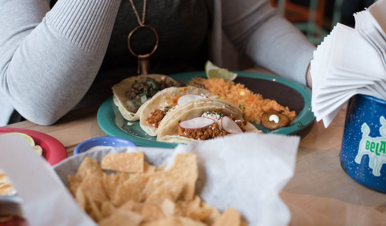 Tacos and Mexican rice on a plate
