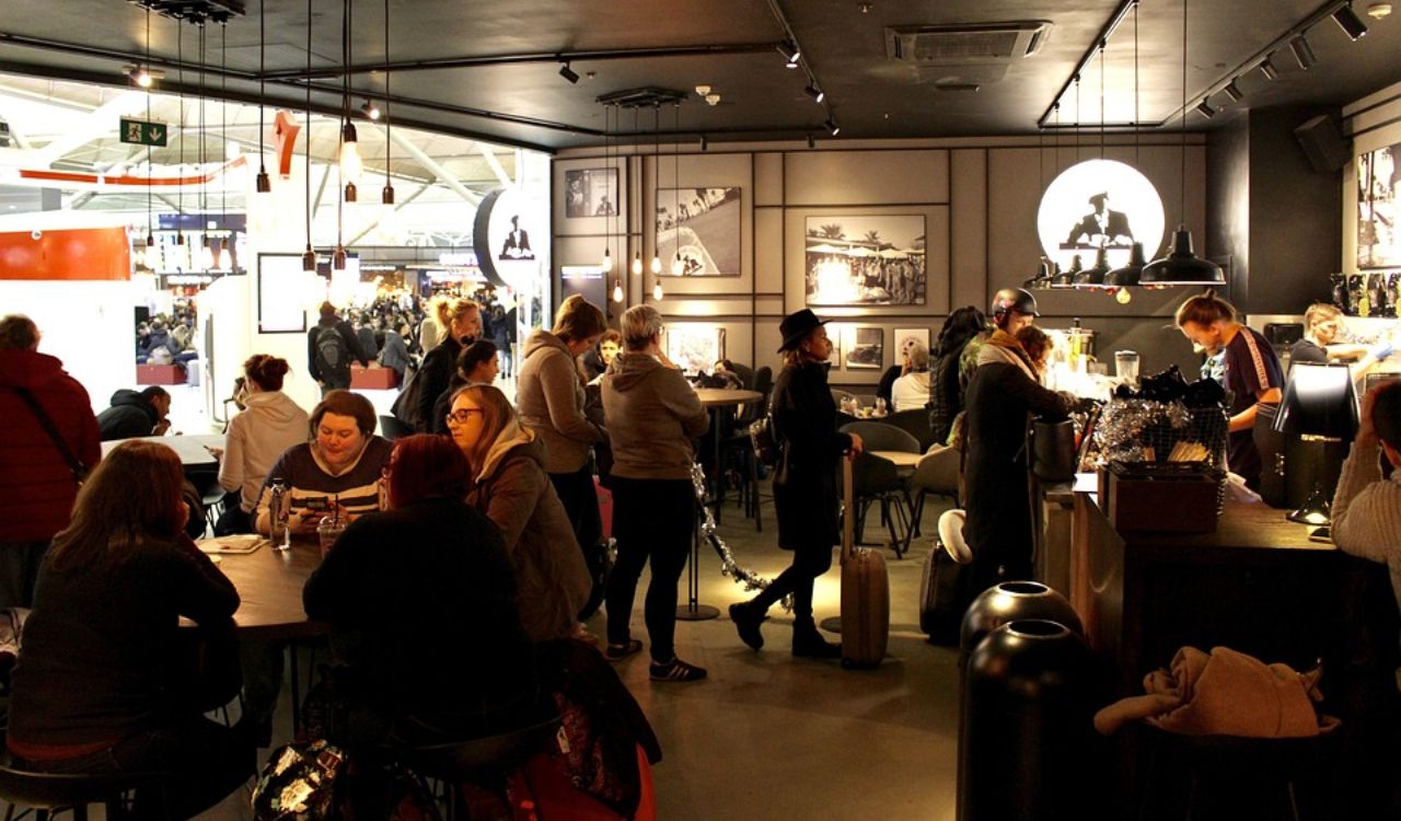 Travelers in an airport restaurant
