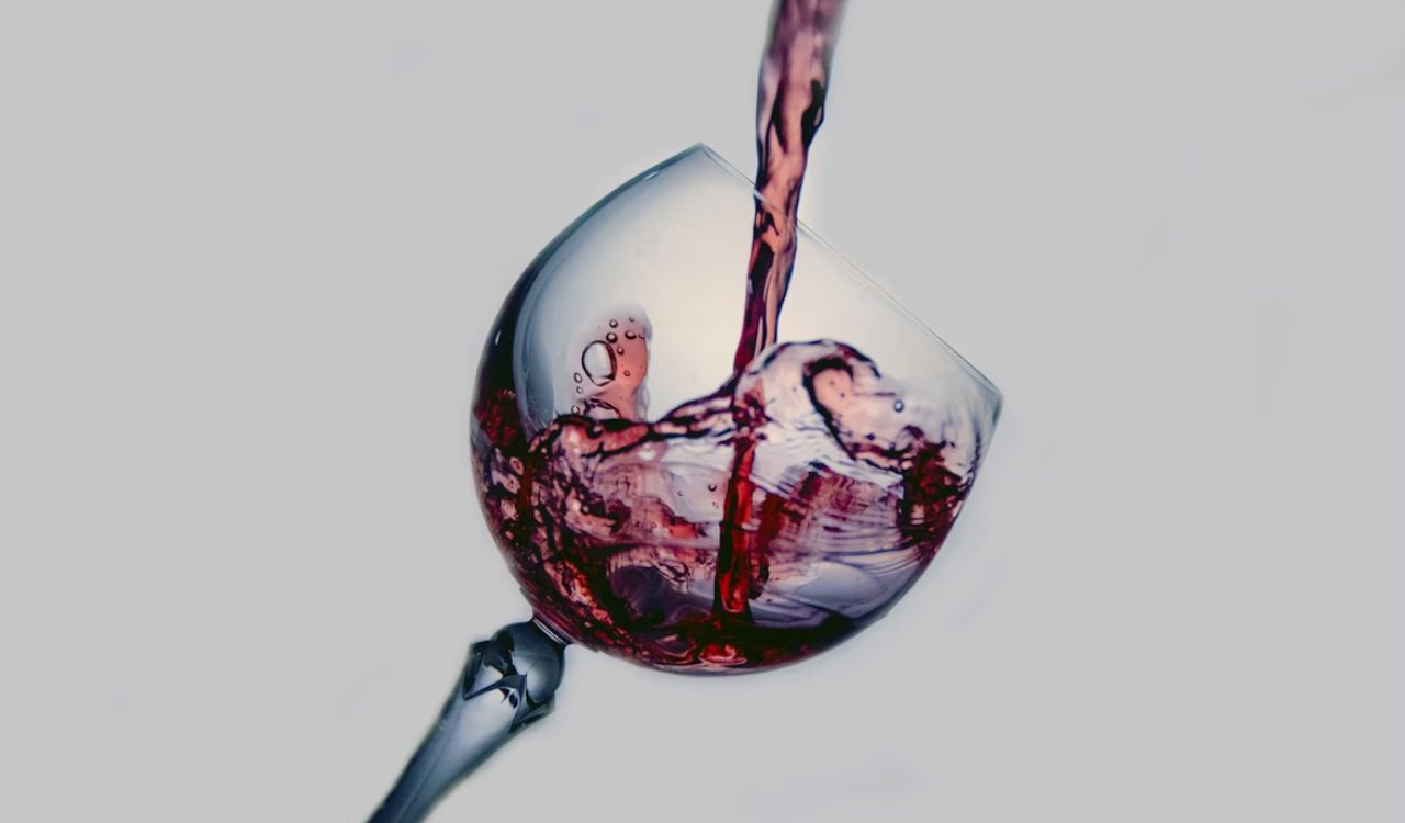 Wine being poured in a glass