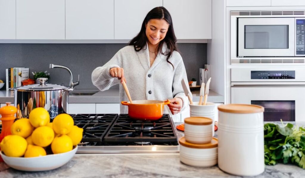 Woman cooking in kitchen