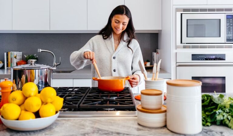 Woman cooking in kitchen