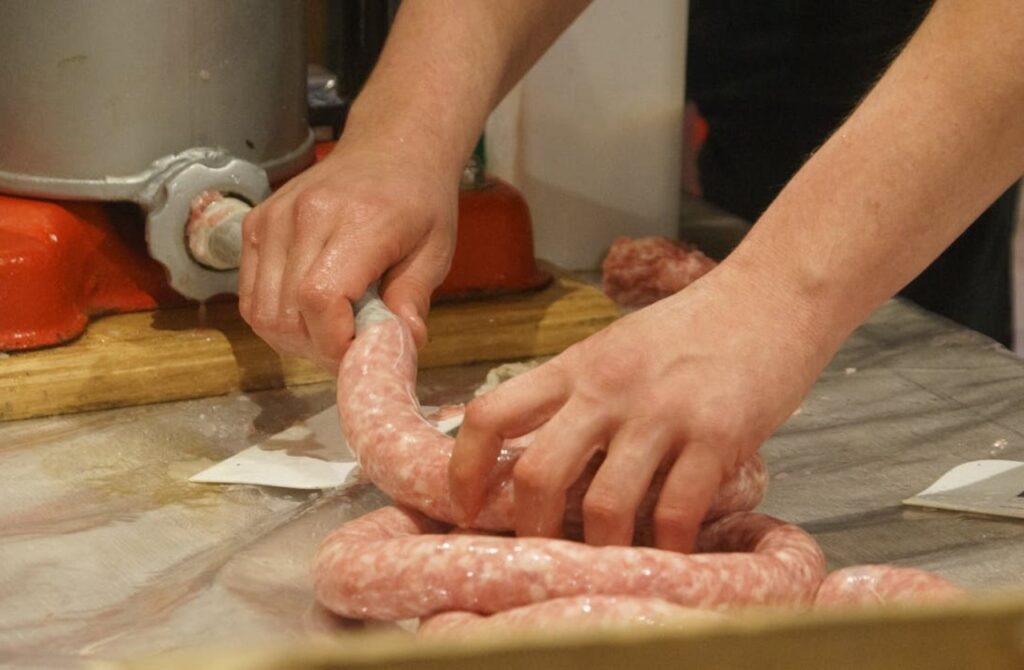 Close-up of Sausage Making Process