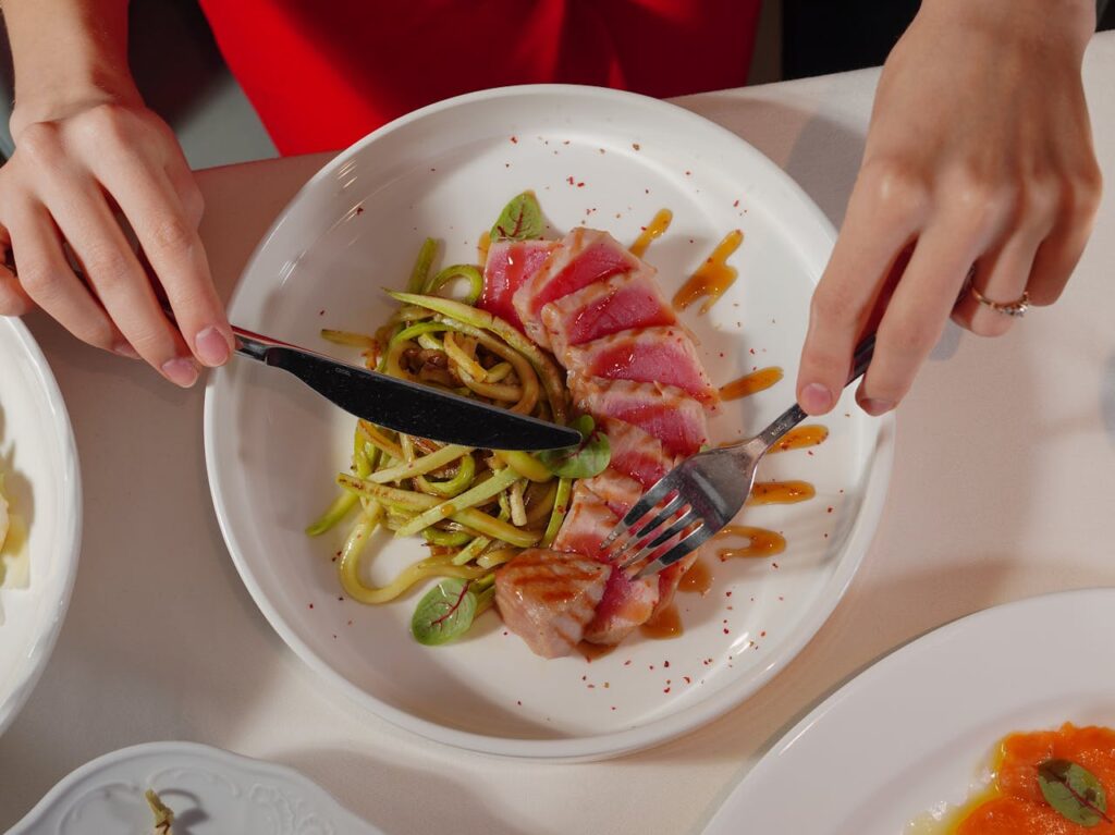 Woman eating healthy dinner