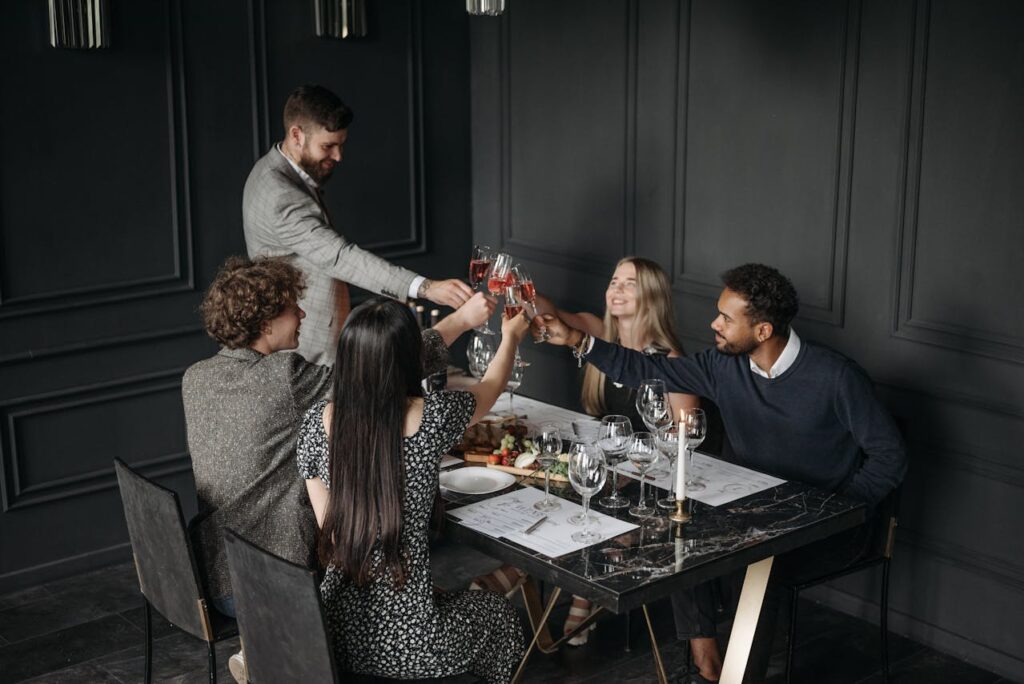 vintage family dining out, people in formal wear at restaurant, classic steakhouse interior.
