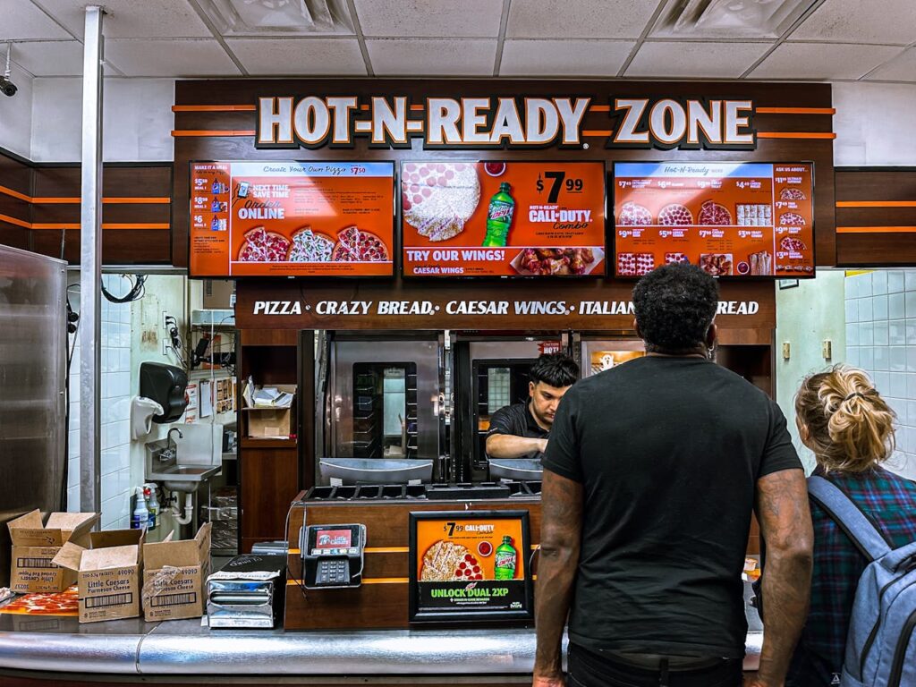 Fast food digital menu board with highlighted combo deals
