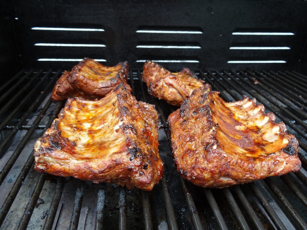 Close-up of Texas-style spare ribs on a smoker,